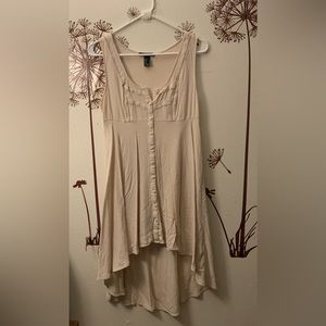 Selling a train cream dress